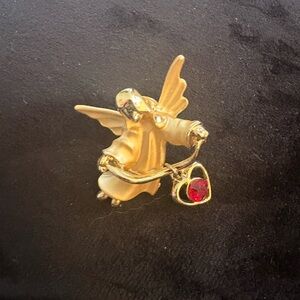 Vintage Angel pin with red heart stone